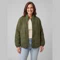 Timber oversized quilted jacket in khaki olive green on model