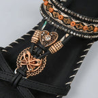 Vittoria Ibiza boho sandals ornament and beaded band close-up