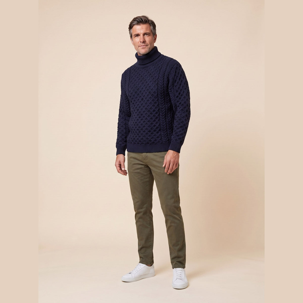 Aran Fisherman Turtleneck Sweater in navy – front view