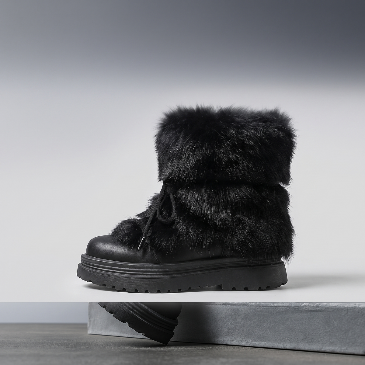 Aspen Faux Fur Après-Ski Boots in black – side view