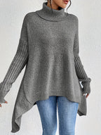 Audrey Cozy Sweater by Vera Noir – styled with a pleated skirt