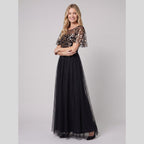 Azura | Sequin Bodice Tulle Maxi Dress by Vera Noir – in black and gold