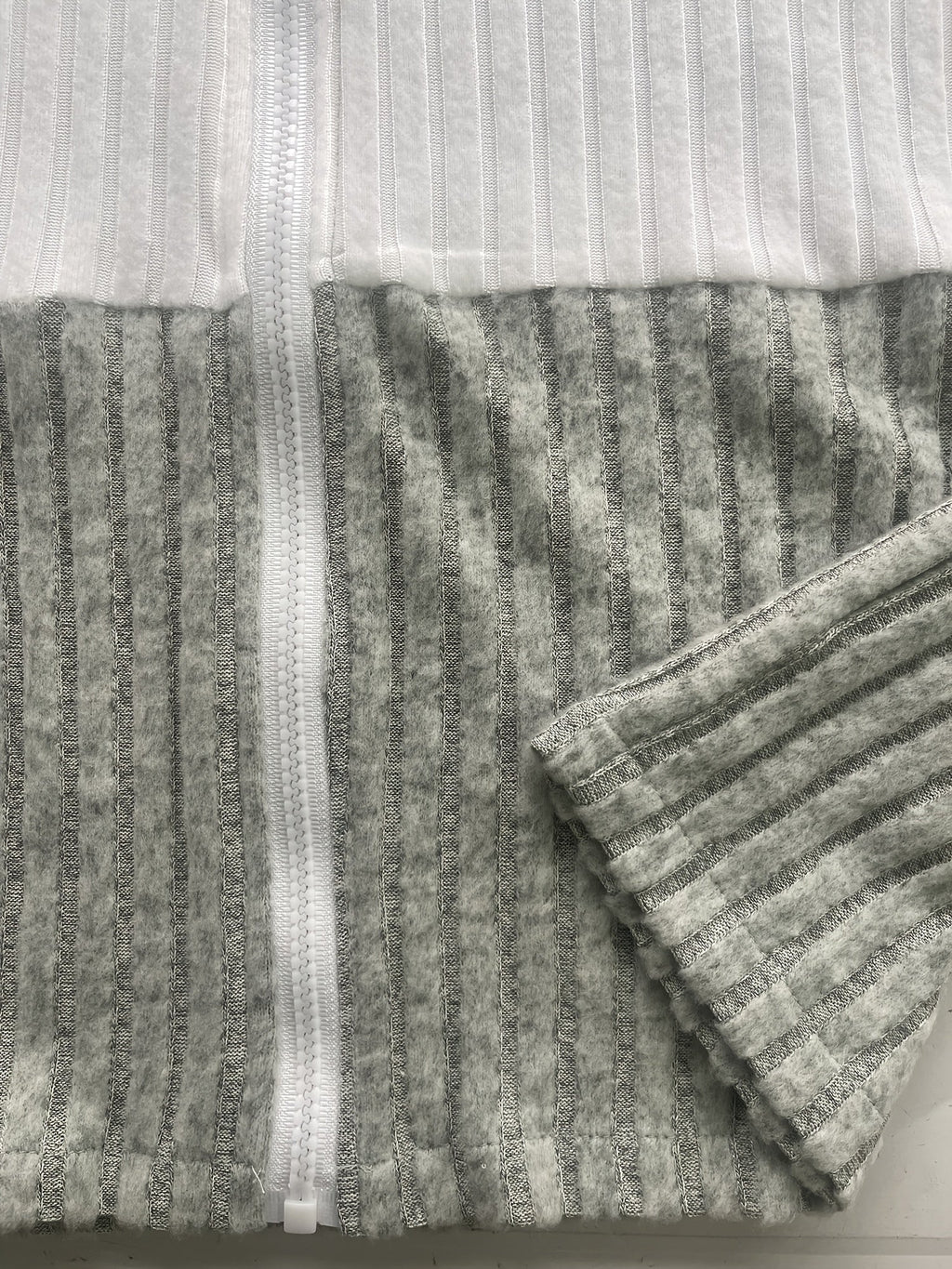 Cecilia | Textured Colour-Block Hooded Jacket – detail view