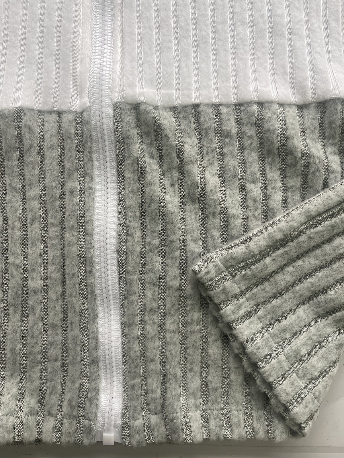 Cecilia | Textured Colour-Block Hooded Jacket – detail view