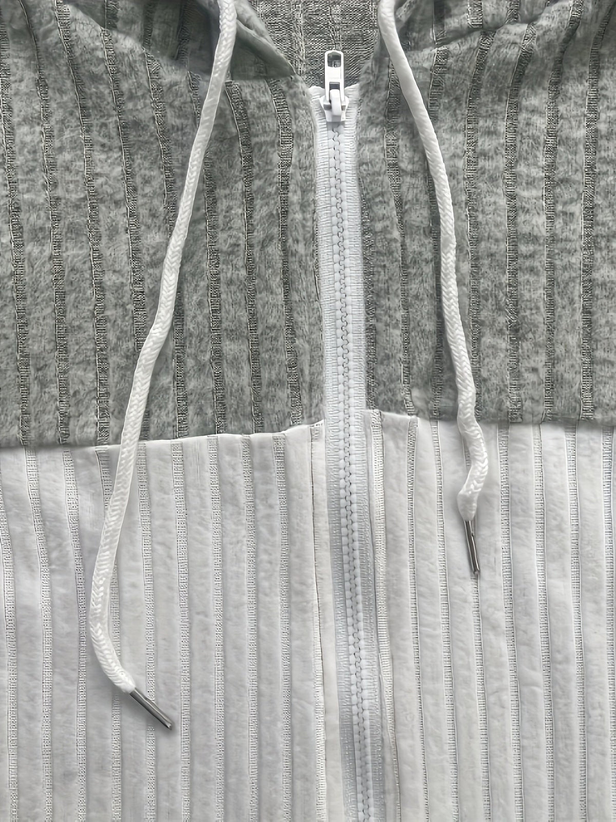 Cecilia | Textured Colour-Block Hooded Jacket – detail view
