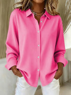 Connie Elegant Flowing Blouse by Vera Noir – front view