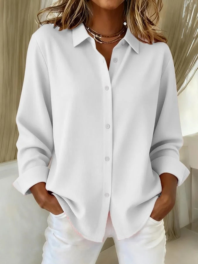 Connie Elegant Flowing Blouse by Vera Noir – side view