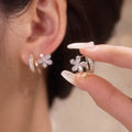 Florelle floral alloy earrings, close-up front view