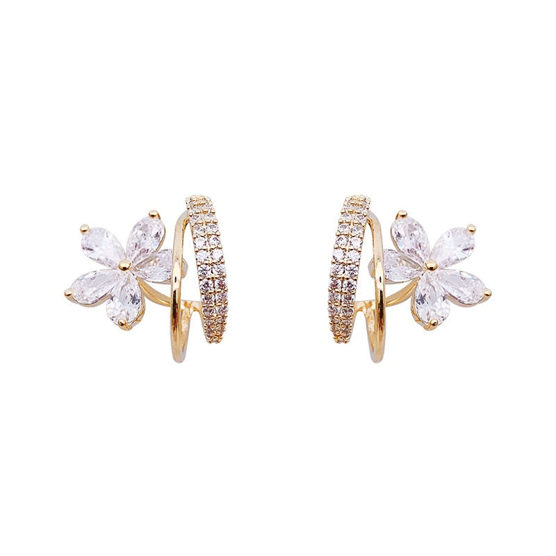Florelle earrings detail shot showing floral silhouette