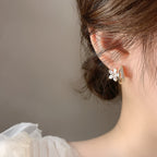 Florelle earrings on a neutral background