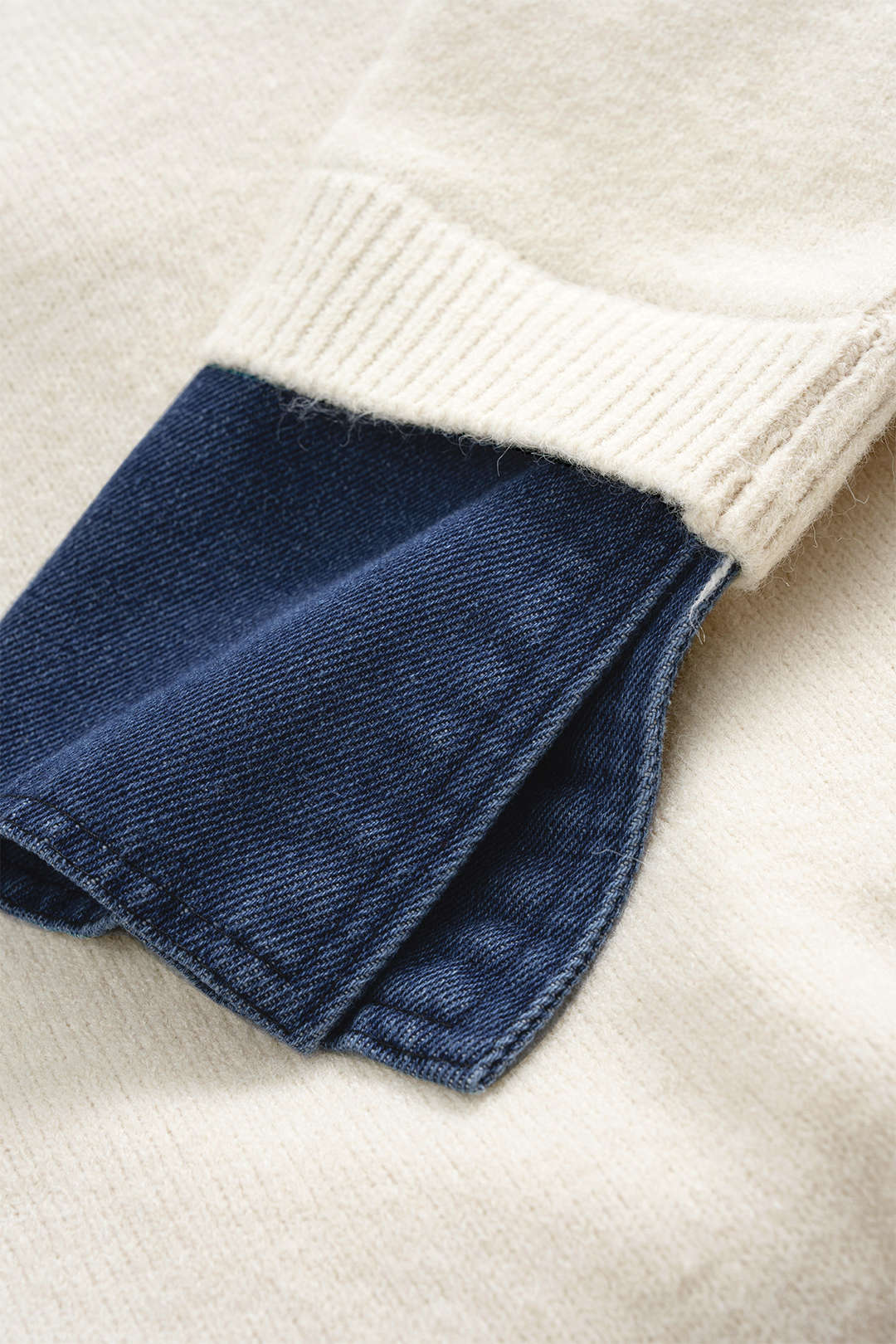 Hedda denim-collar patchwork knit sweater by Vera Noir – arm detail