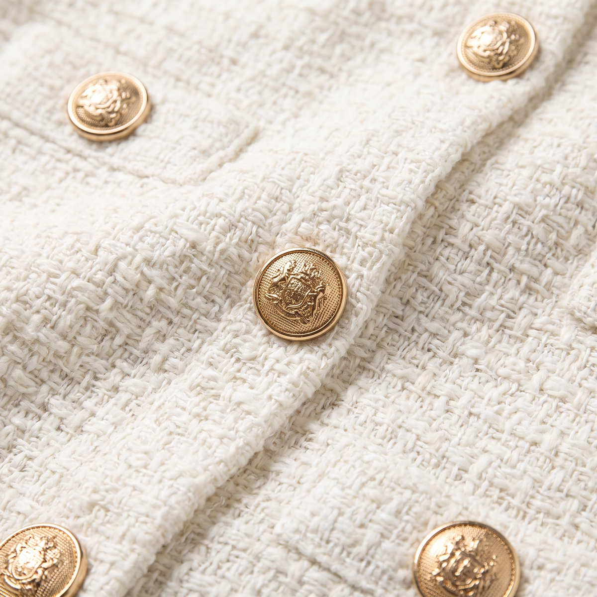 Hortense | Lined Tweed Midi Dress, Gold Buttons by Vera Noir – detail view of the tweed