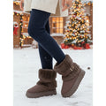 Ilaria | Fur-Trimmed Buckle Snow Boots – styled view in snow