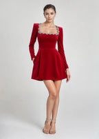 Josiane | Crystal Trim Velvet Mini Dress – styled view in red, hands in pockets