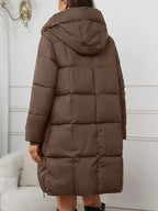 Katrien | Hooded Longline Puffer Coat – back view in brown