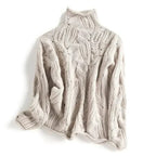 Lara Chunky Cable-Knit Turtleneck Sweater by Vera Noir – front view