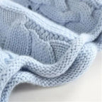 Lara Chunky Cable-Knit Turtleneck Sweater by Vera Noir – detail view