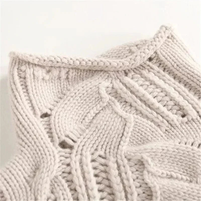 Lara Chunky Cable-Knit Turtleneck Sweater by Vera Noir – styled view