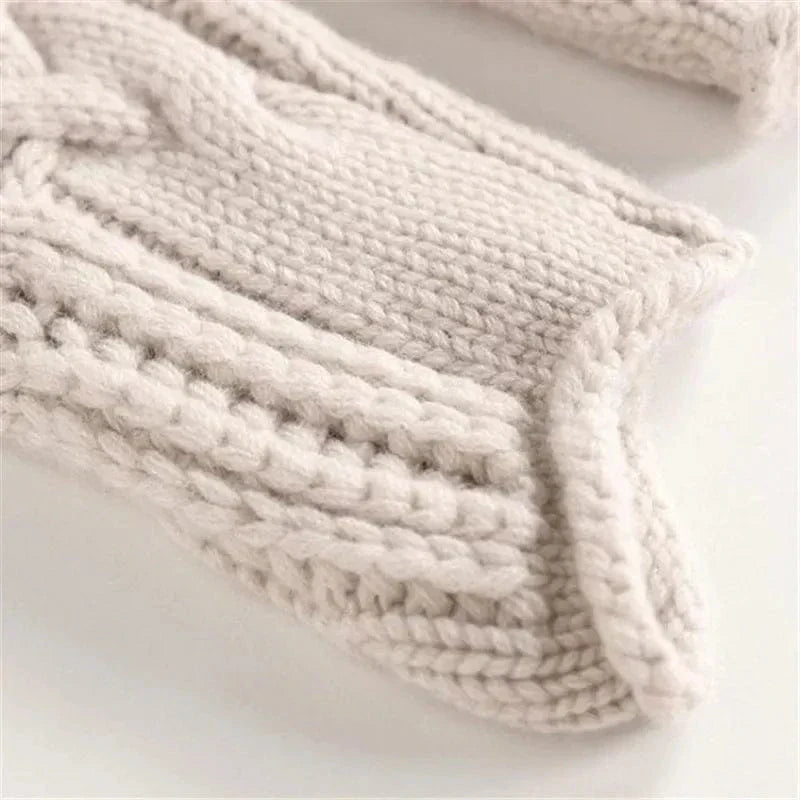 Lara Chunky Cable-Knit Turtleneck Sweater by Vera Noir – close-up