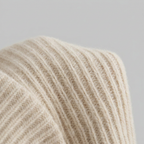 Liora Cashmere-Blend Turtleneck Sweater – knit fabric close-up