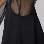 Matilda | Sheer Sleeve Evening Dress by Vera Noir – detail view of the sheer sleeve