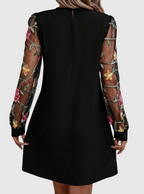 Neravira plunge-neck dress with sheer sleeves, detail view