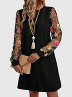 Neravira plunge-neck dress with sheer sleeves, styled view