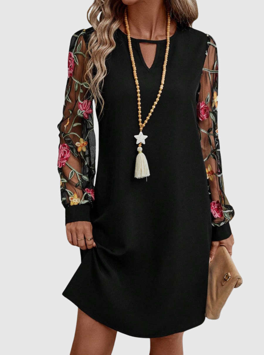 Neravira plunge-neck dress with sheer sleeves, side view
