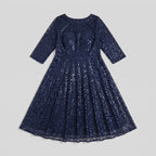 Novara | Sequin Lace Tea-Length Dress by Vera Noir – front view