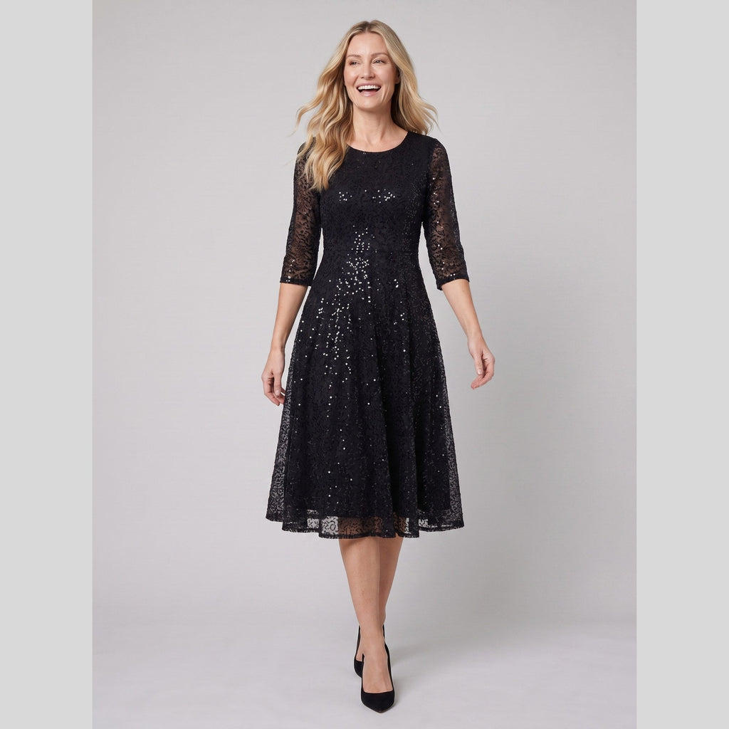 Novara | Sequin Lace Tea-Length Dress by Vera Noir – in black