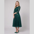 Novara | Sequin Lace Tea-Length Dress by Vera Noir – in dark green