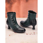 Prudence | Vintage Buttoned Ankle Boots – side view in black and green
