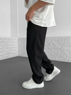 Rive Ribbed Relaxed Fit Trousers – styled view
