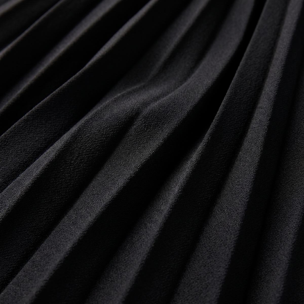 Siena | Belted Pleated A-Line Midi Dress by Vera Noir – detail view of the fabric