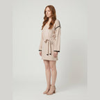 Wilma | Soft Knit V-Neck Pull-On Dress by Vera Noir – side view