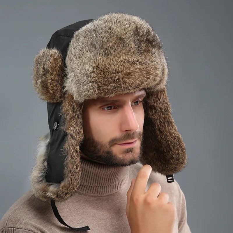Wilma winter hat with ear flaps, styled with a winter coat